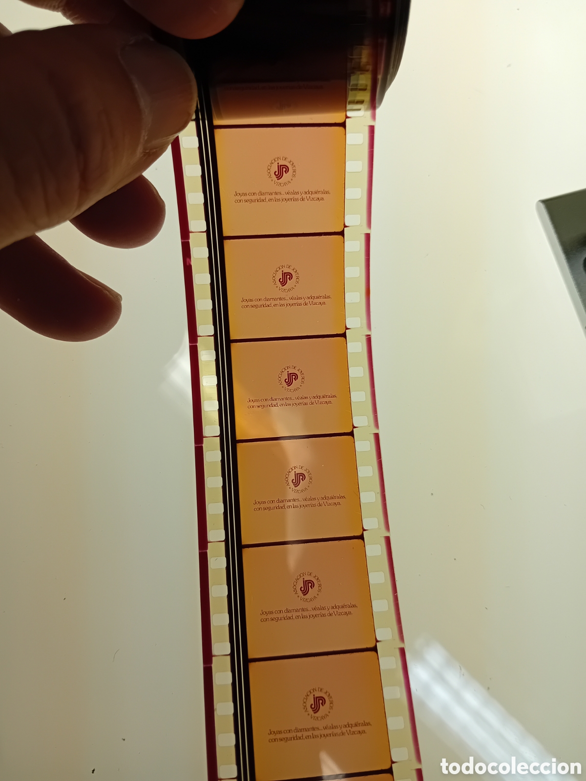 Cine: ROLLO 35MM CON COLA DE ASOCIACI&Oacute;N JOYEROS DE VIZCAYA PARA ANUNCIO DE ROLEX. A&Ntilde;OS 70