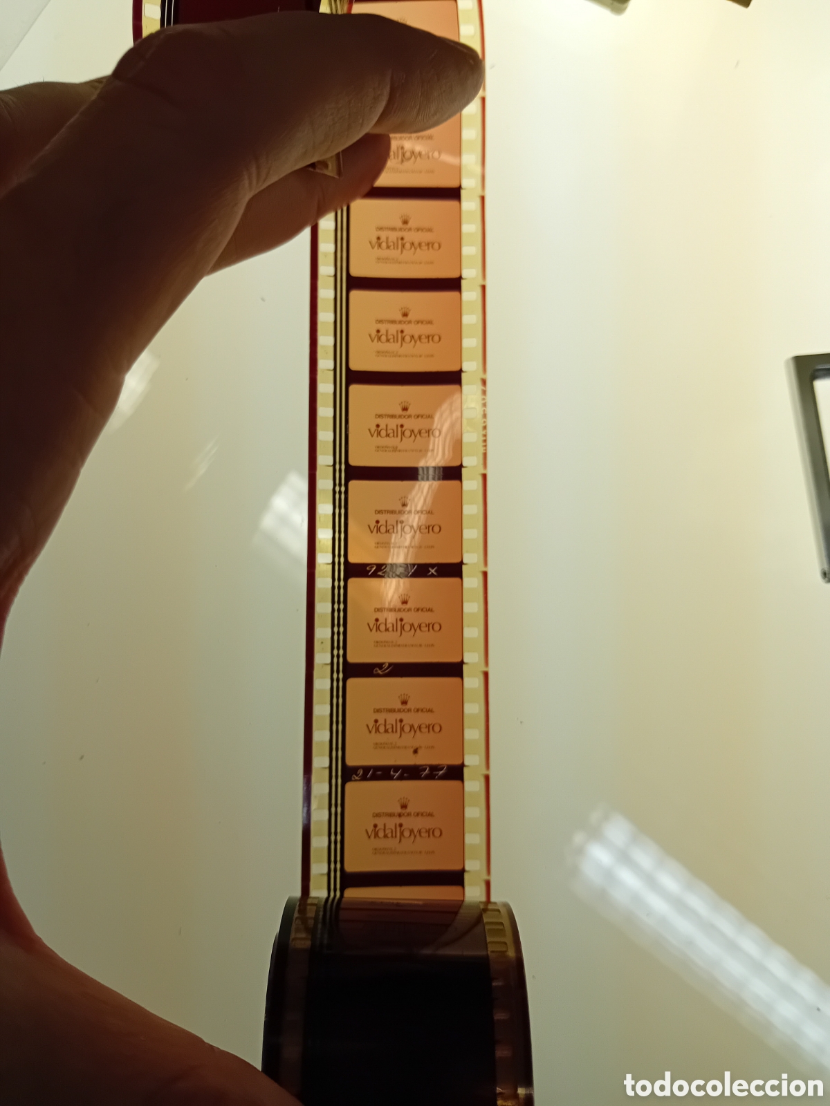Cine: ROLLO 35MM CON COLA DE VIDAL JOYERO (LEON) PARA ANUNCIO DE ROLEX. A&Ntilde;OS 70