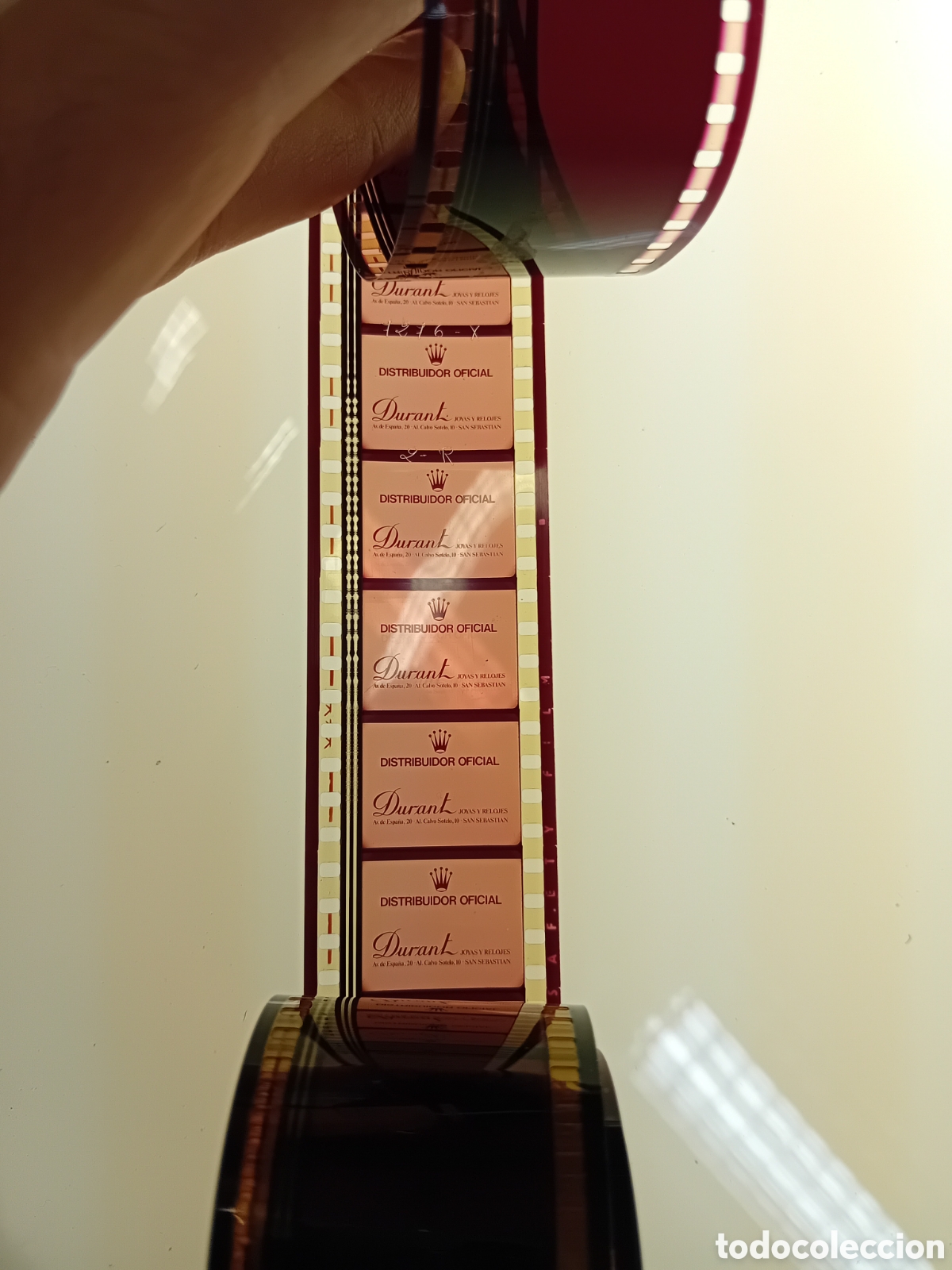 Cine: ROLLO 35MM CON COLA DE JOYERIA DURANT (SAN SEBASTIAN) PARA ANUNCIO DE ROLEX. A&Ntilde;OS 70