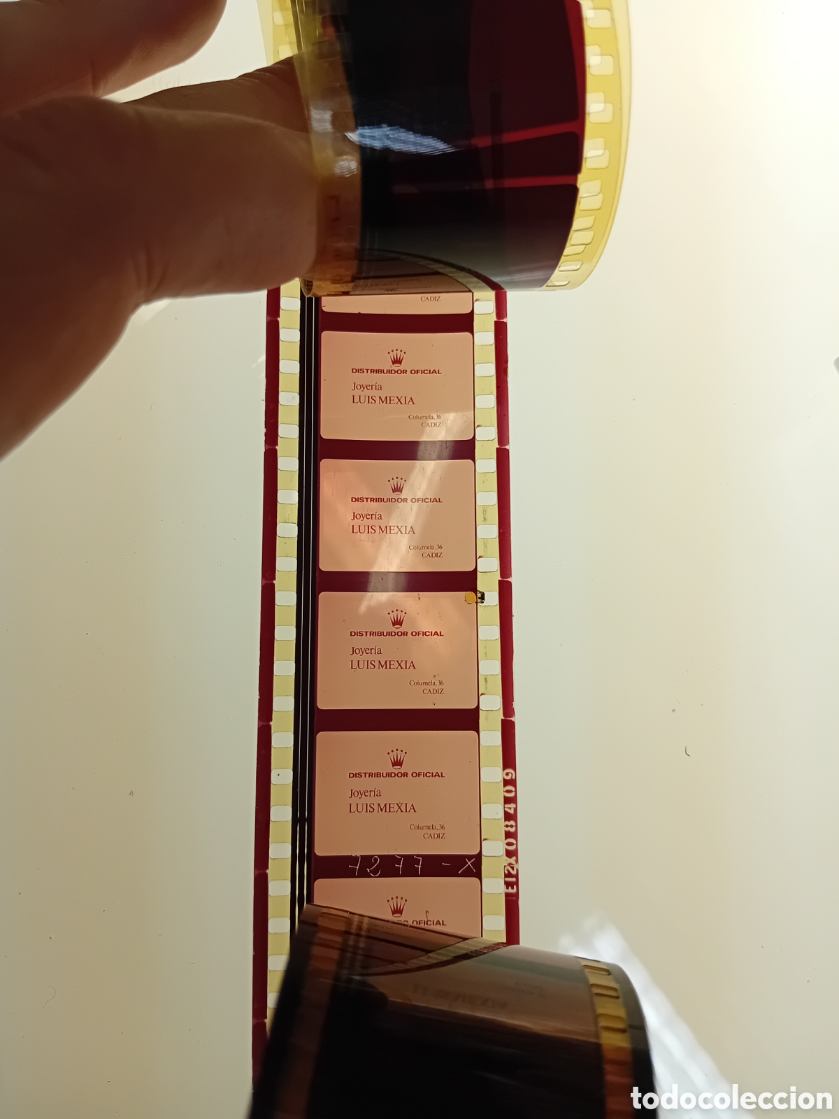 Kino: ROLLO 35MM CON COLA DE JOYERIA LUIS MEXIA (CADIZ) PARA ANUNCIO DE ROLEX. A&Ntilde;OS 70