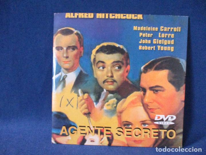 Cinema: DVD - AGENTE SECRETO / FUNDA DE CART&Oacute;N PEQUE&Ntilde;A