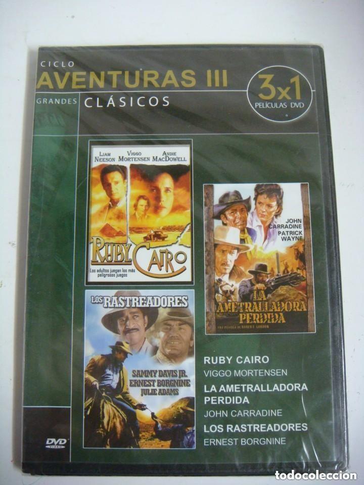 Cine: D.V.D. DE 3 X 1 PELICULAS-RUBY CAIRO-LOS RASTREADORES-LA AMETRALLADORA ES NUEVA.