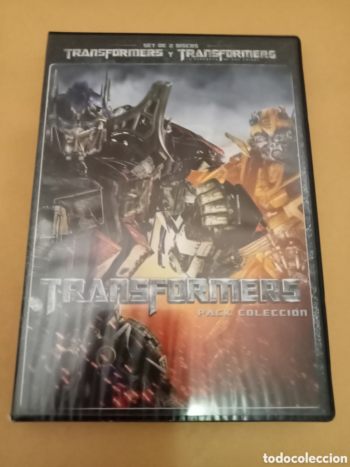 Cine: 2 DVDs. Transformers 1 y 2.