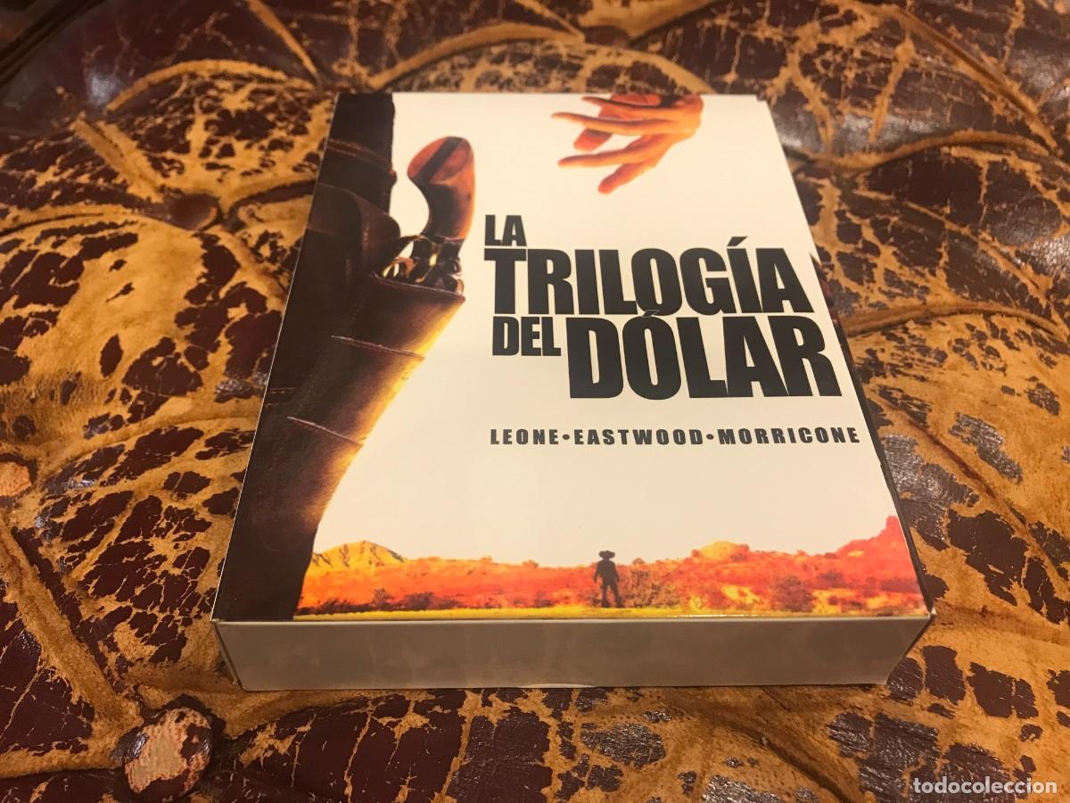 Cinema: DVD. LA TRILOG&Iacute;A DEL D&Oacute;LAR. LEONE-EASTWOOD-MORRICONE (4 DISCOS + ESTUCHE + LIBRO 95 P&Aacute;G + P&Oacute;STER)