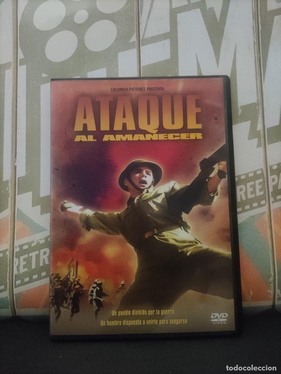 Cine: DVD 2102 Ataque al amanecer / Disco con se&ntilde;ales de uso