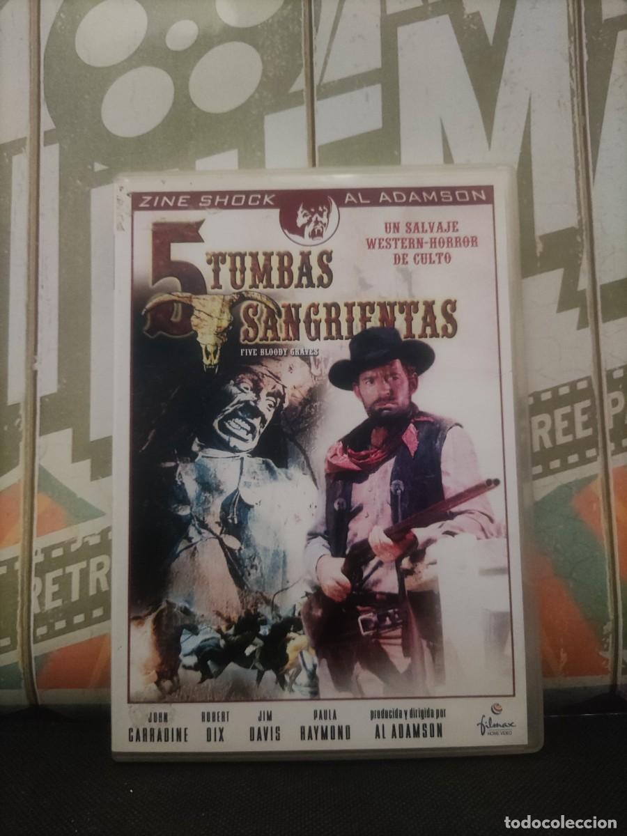 Cine: DVD 2139 5 Tumbas sangrientas / Disco con se&ntilde;ales de uso