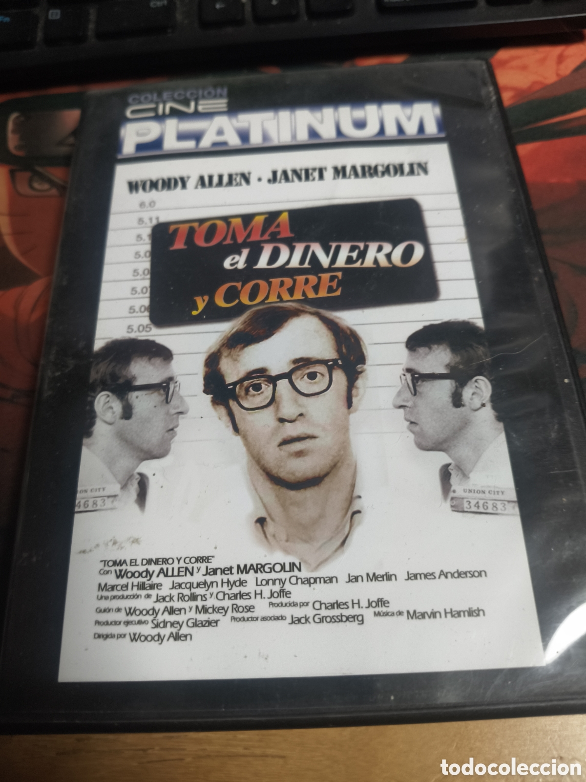 Cine: Toma el dinero y corre DVD - 246