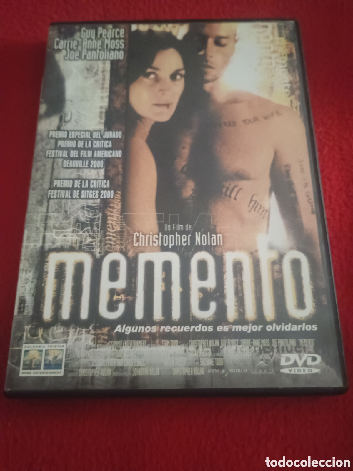 Cine: Dvd memento - Christopher nolan guy Pierce Carrie ann moss