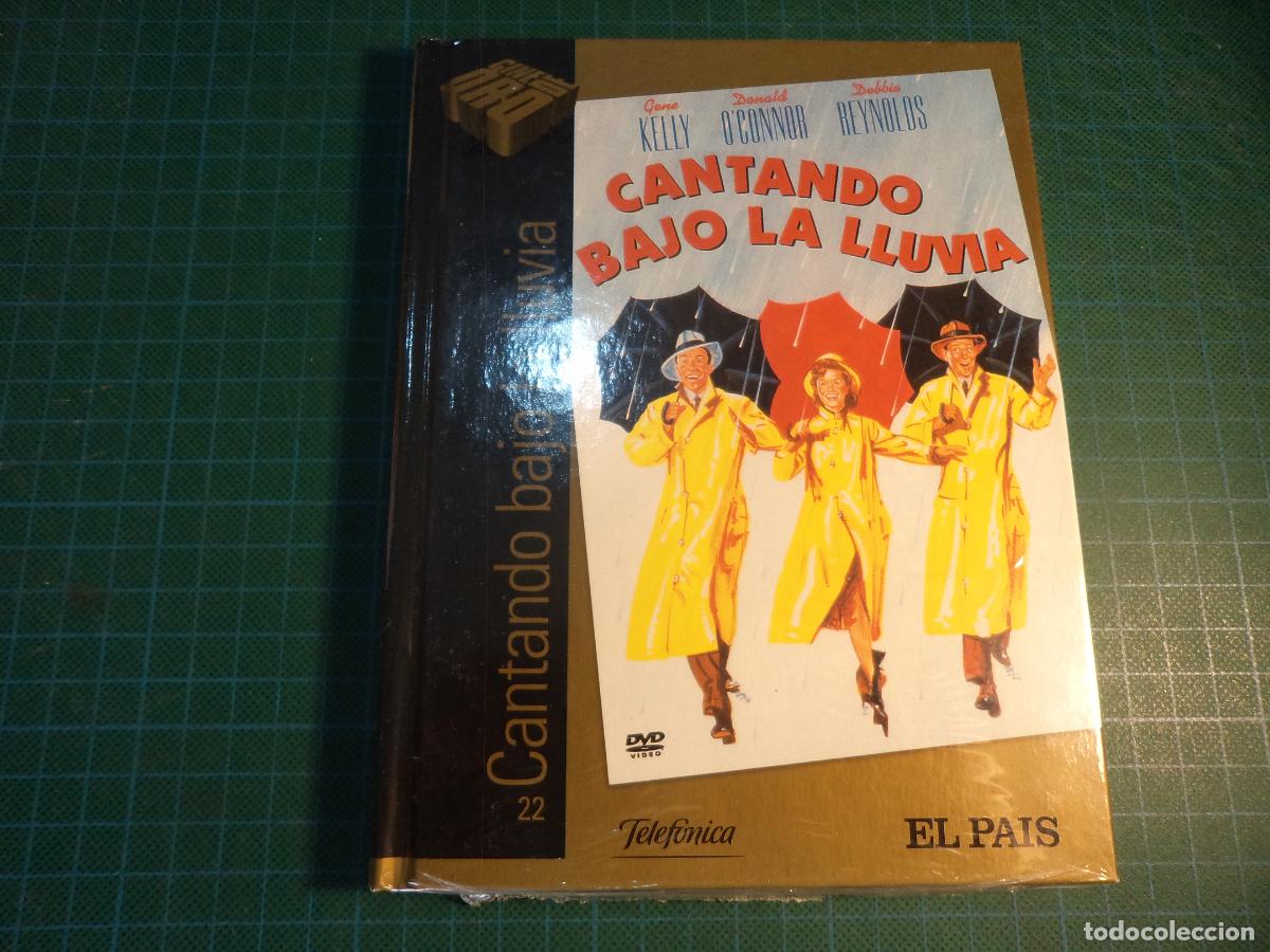 Cine: Cantando bajo la lluvia. Libro + DVD. Precintada. (P-62)