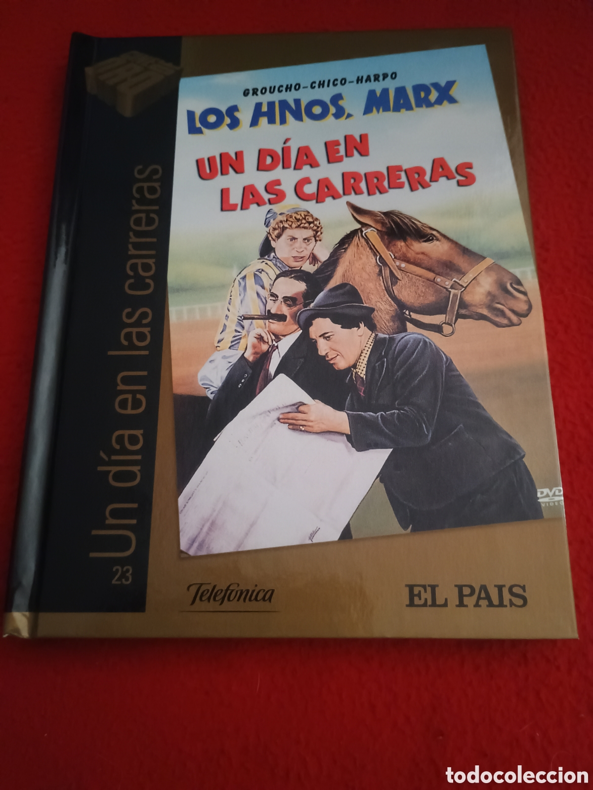 Cine: Libro dvd un d&iacute;a en las carreras - hermanos Marx