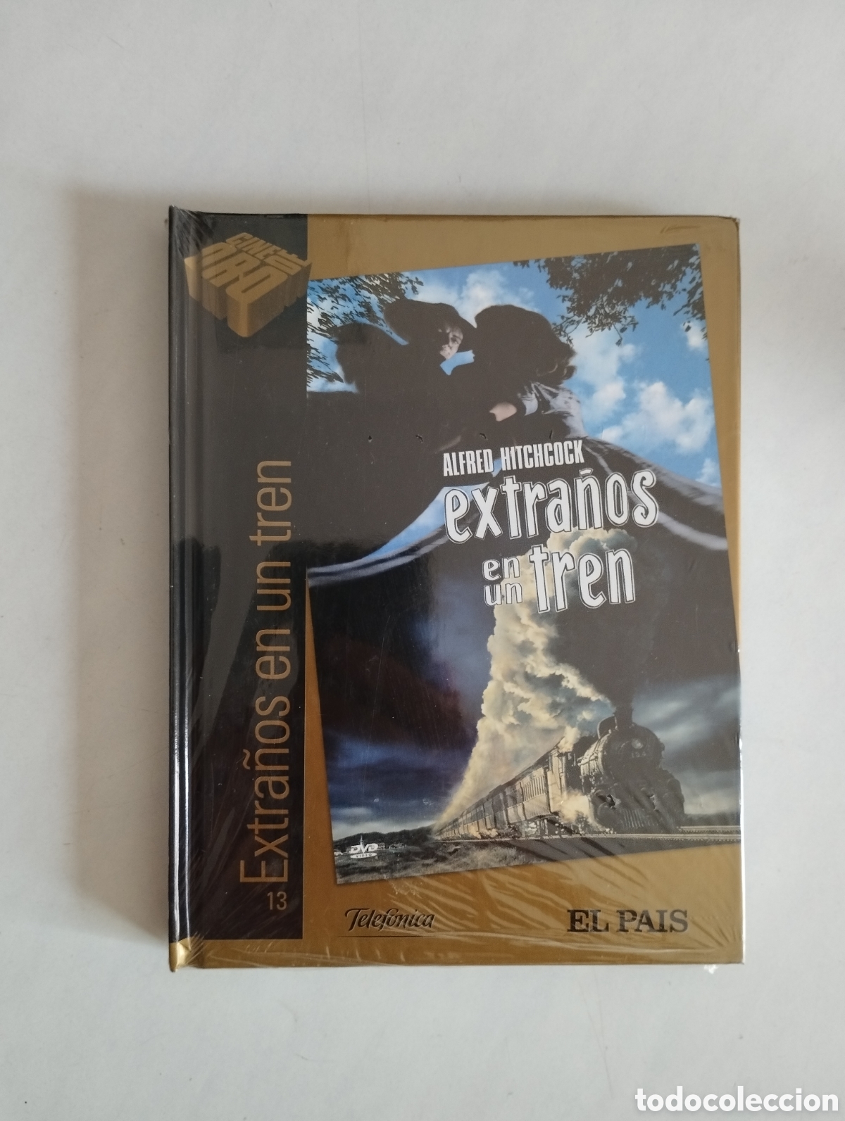 Cine: PELICULA DVD + LIBRO EXTRA&Ntilde;OS EN UN TREN SIN ABRIR PRECINTADA