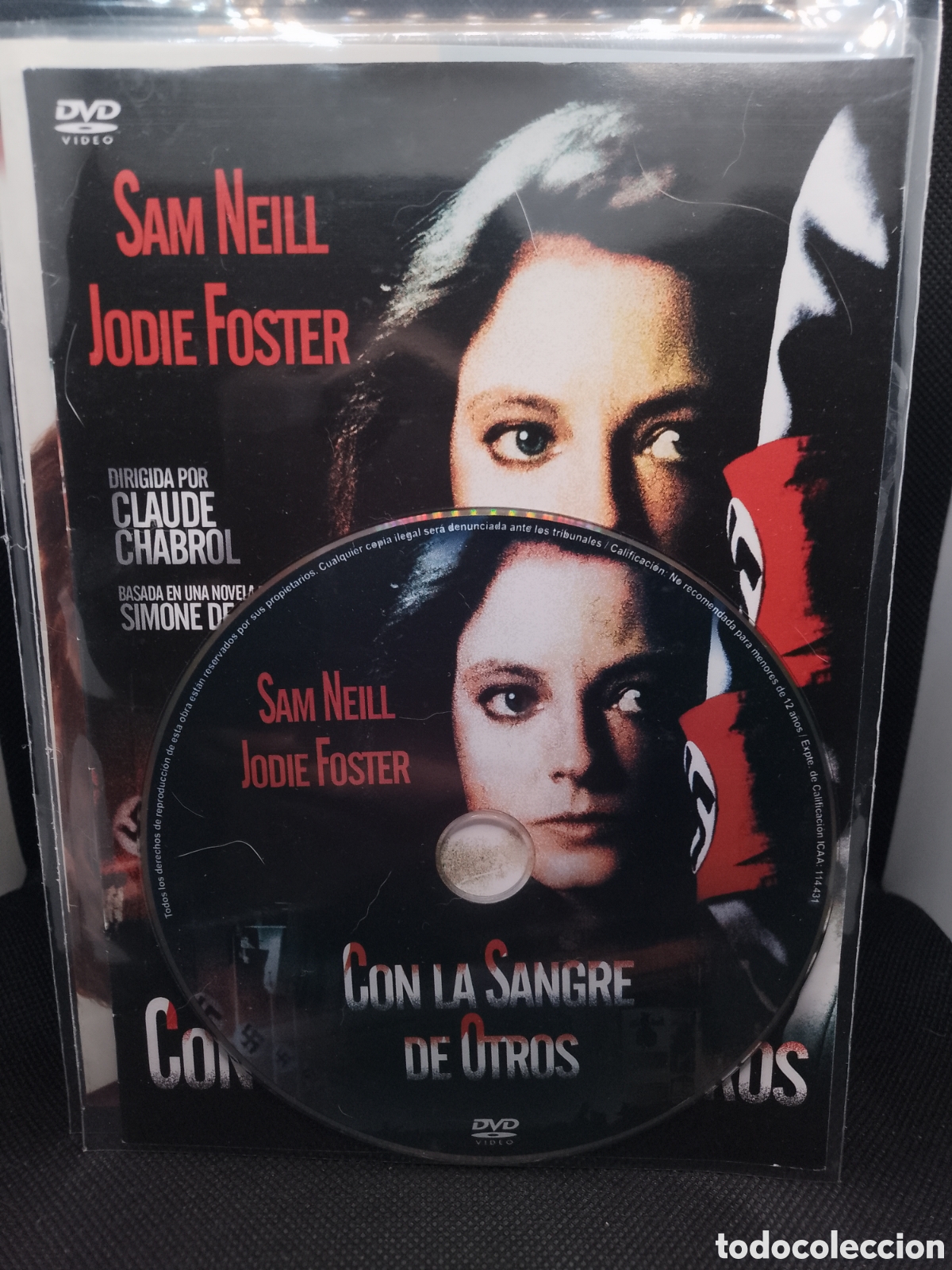 Cine: CON LA SANGRE DE OTROS - SOLO DISCO DVD Y CARATULA PARTE FRONTAL