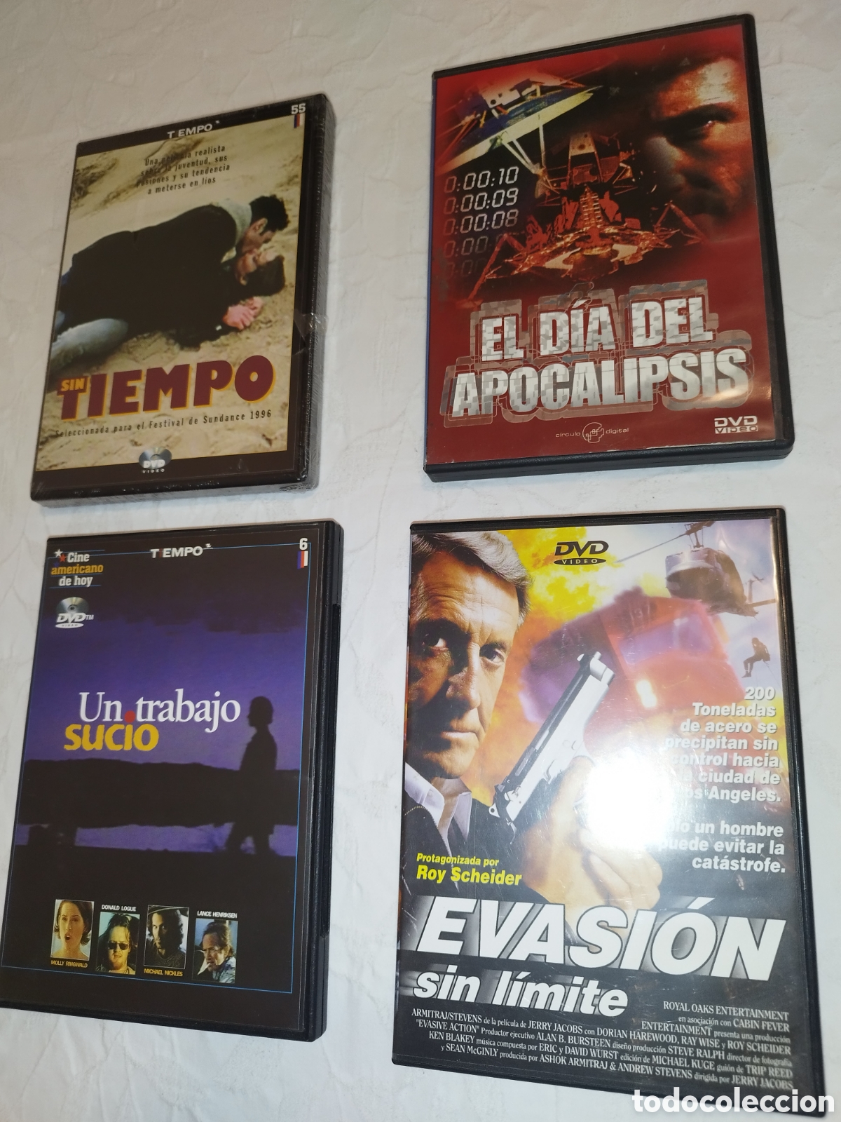 Cine: DVD. 4 PELICULAS: SIN TIEMPO / EL DIA DEL APOCALIPSIS / UN TRABAJO SUCIO / EVASION SIN LIMITE.