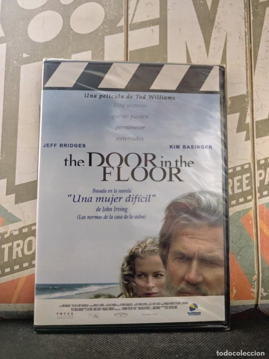 Cinema: DVD Slim 136 The door in the floor / Caja fina precintado