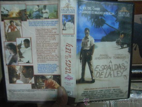 A ESPALDAS DE LA LEY -VHS