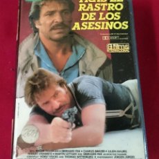 Cine: TRAS EL RASTRO DE OS ASESINOS VHS. Lote 63273684