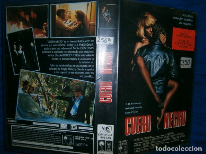 Cinema: (PELICULA VHS)-CUERO NEGRO