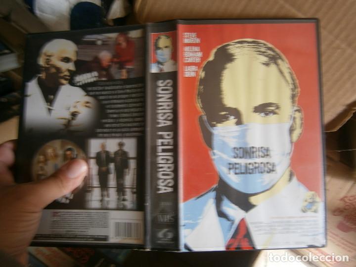 Kino: &iexcl;SONRISA PELIGROSA&iexcl;&iexcl;CAJA GRANDE&iexcl;&iexcl;DISPONEMOS DE MAS DE 60.000&iexcl;PELICULAS VHS BETA 2000&iexcl;