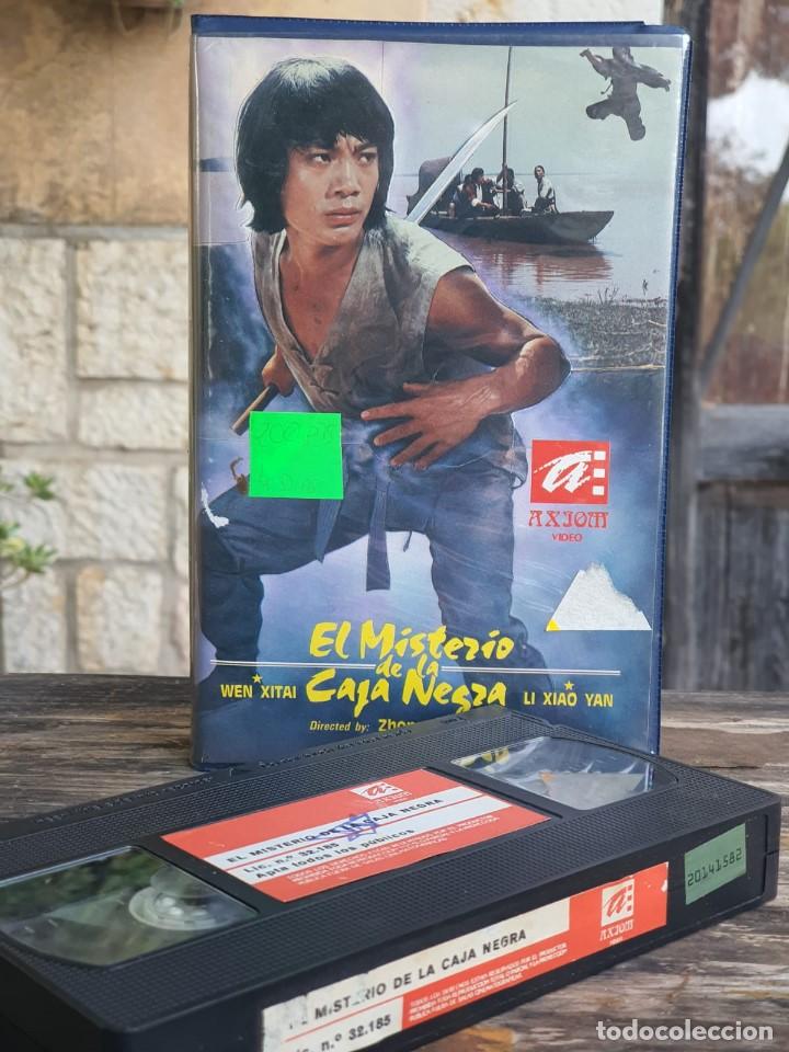 Cine: EL MISTERIO DE LA CAJA NEGRA - ZHONG SHUHUANG - WEN XITAI , LI XIAO YAN - AXJOM