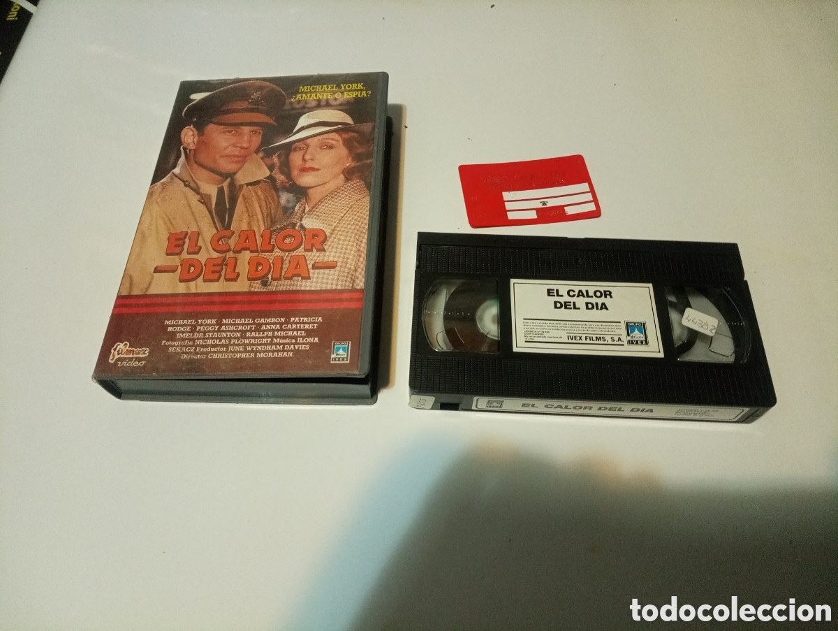 Cine: VHS EL CALOR DEL DIA - Foto 1