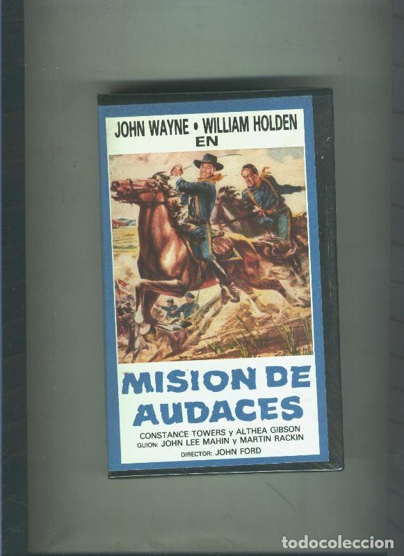Cine: Video VHS: Mision de audaces (John Wayne-William Holden) y Las calaveras (Laurel y Hardy) - Varios