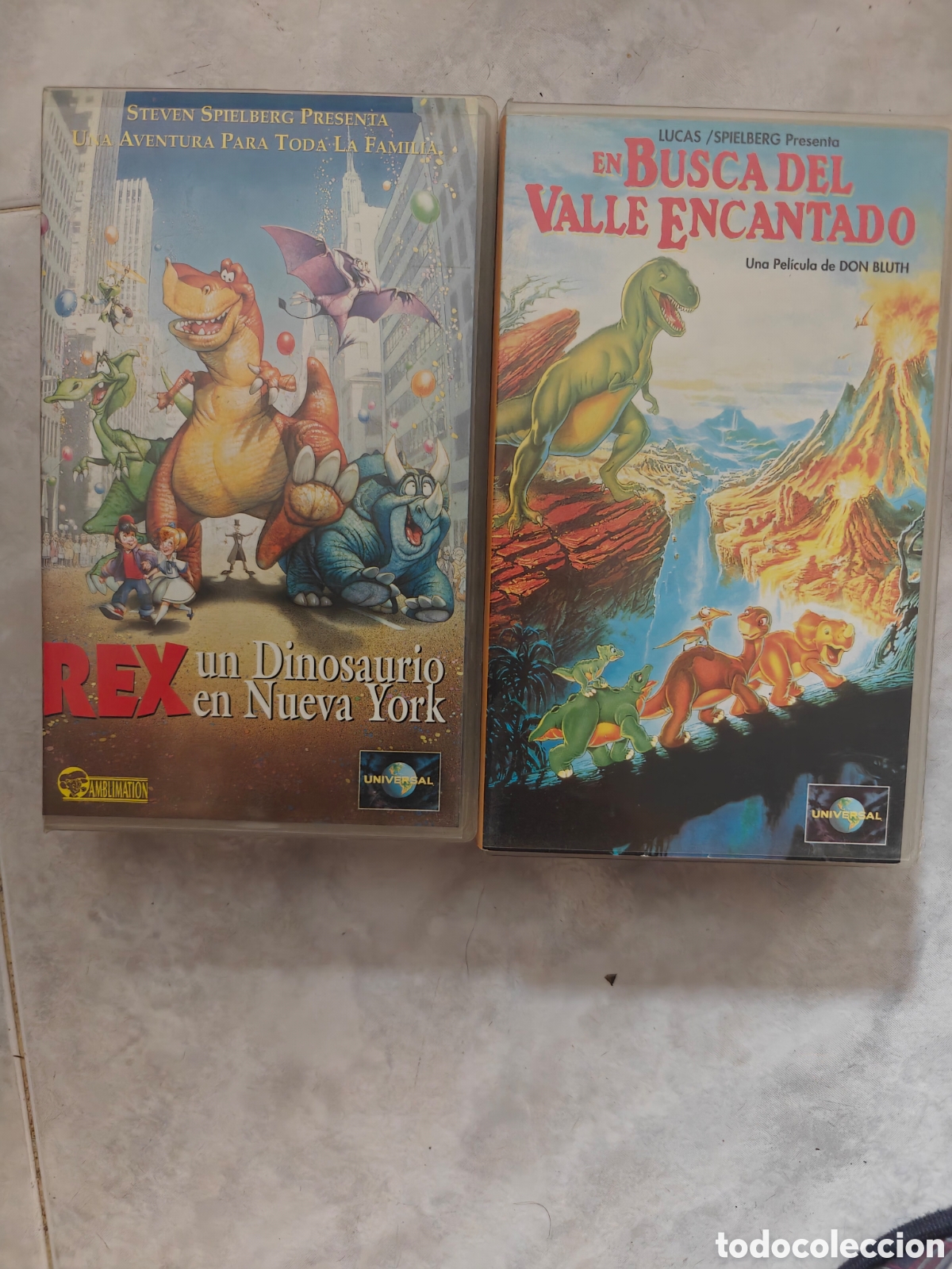 Cine: Lote 2 Cintas VHS Dinosaurios - En Busca del Valle Encantado y Rex - Spielberg / Universa