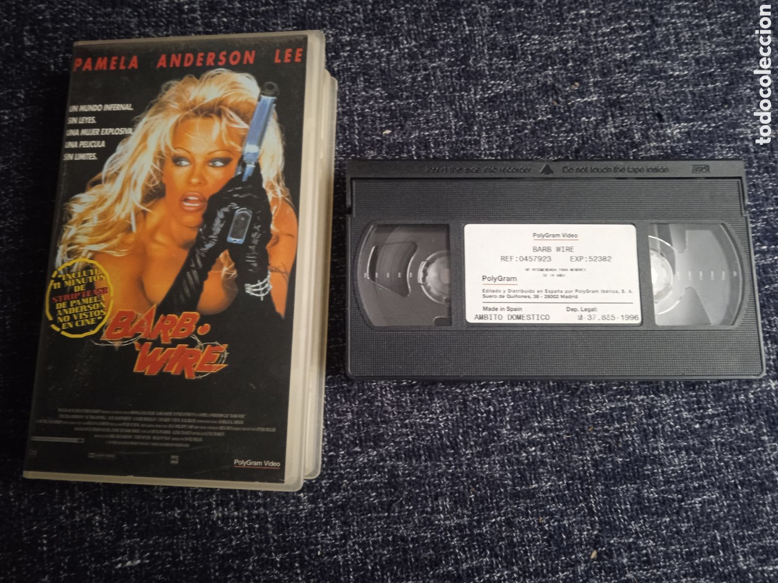 Cine: VHS - BARB WIRE - PAUL HOGAN - PAMELA ANDERSON/