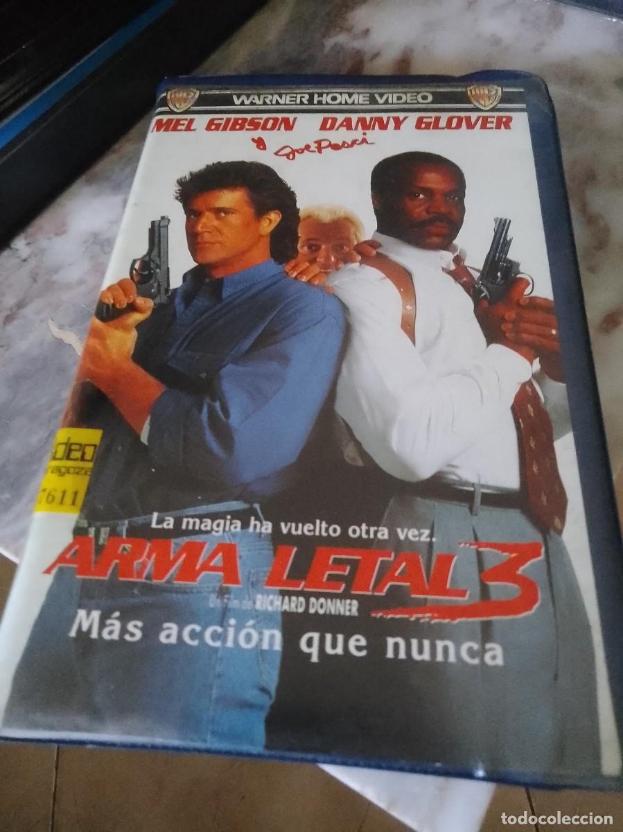 Cine: Arma de tal tres caja grande VHS