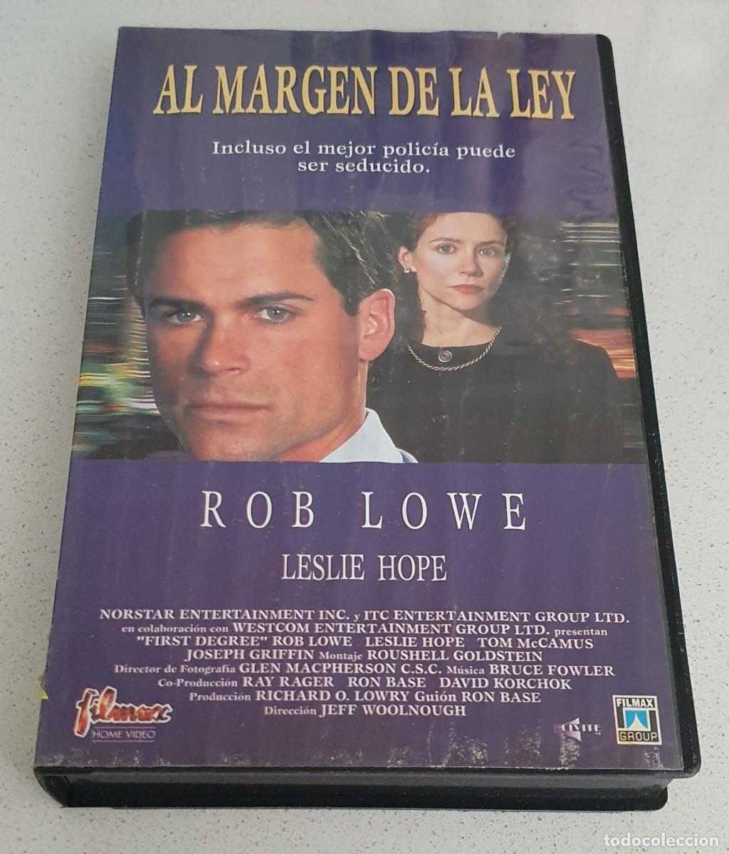 Cine: Pel&iacute;cula Vhs Al Margen de la Ley. Rob Lowe. Filmax 1996. Videoclub alquiler.
