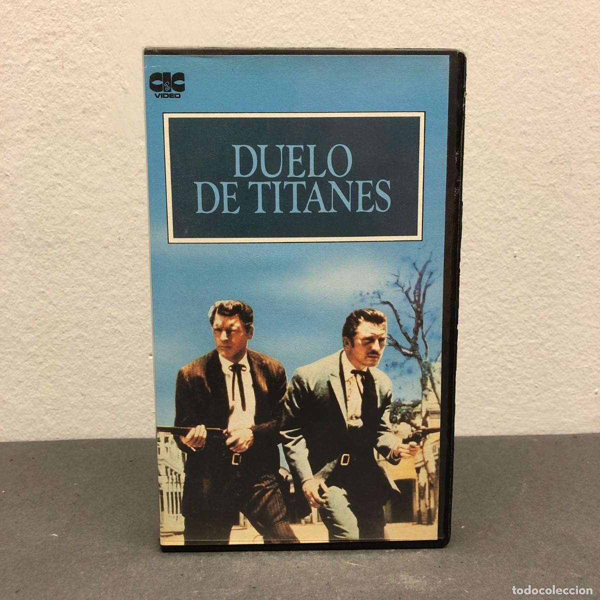 Cine: DUELO DE TITANES - JOHN URIS - VHS - PARAMOUNT PICTURES - PLANETA DEAGOSTINI - 116 MIN. / 750