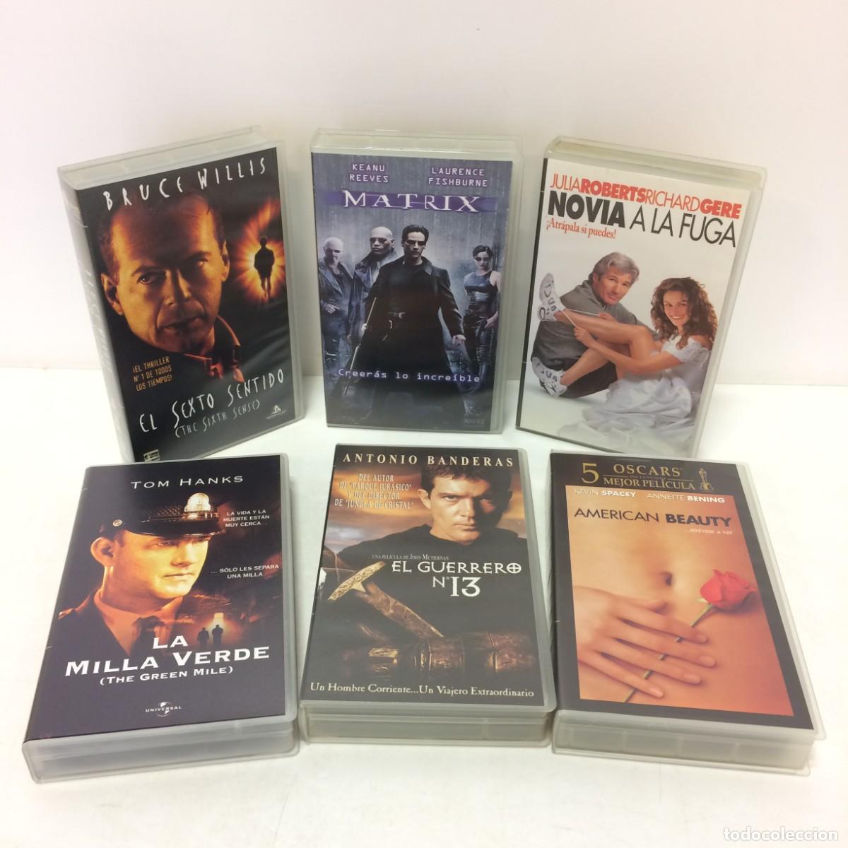 Cinema: Pel&iacute;culas: lote de 58 Pel&iacute;culas VHS + 2 Libros Gran Estreno 5 y caos (amarillo) - Matrix...