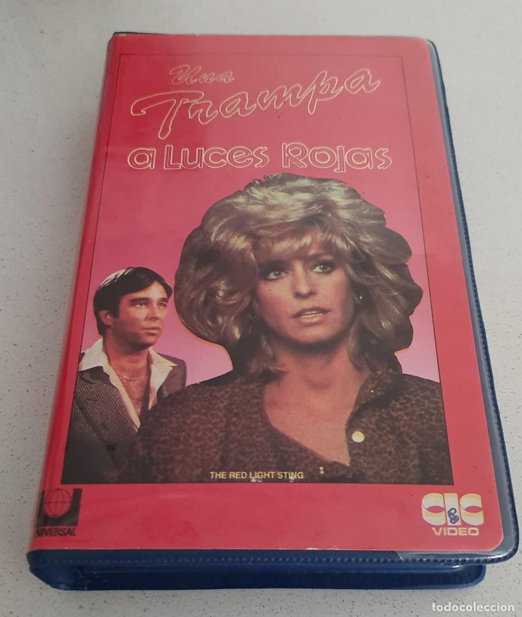 Cine: Pel&iacute;cula VHS Una Trampa a Luces Rojas. Farrah Fawcett, Beau Bridges. CIC 1988 videoclub alquiler.