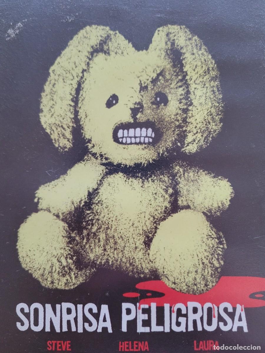 Cine: Sonrisa peligrosa y SPIDERMAN, primera edici&oacute;n, VHS.