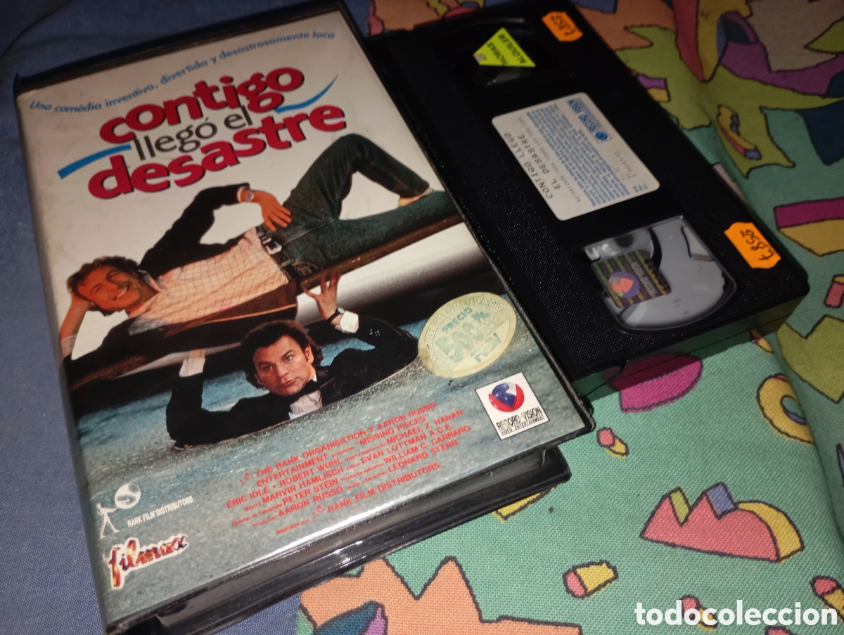 Cine: CONTIGO LLEGO EL DESASTRE- VHS- ERIC IDLE - ROBERT WUHL