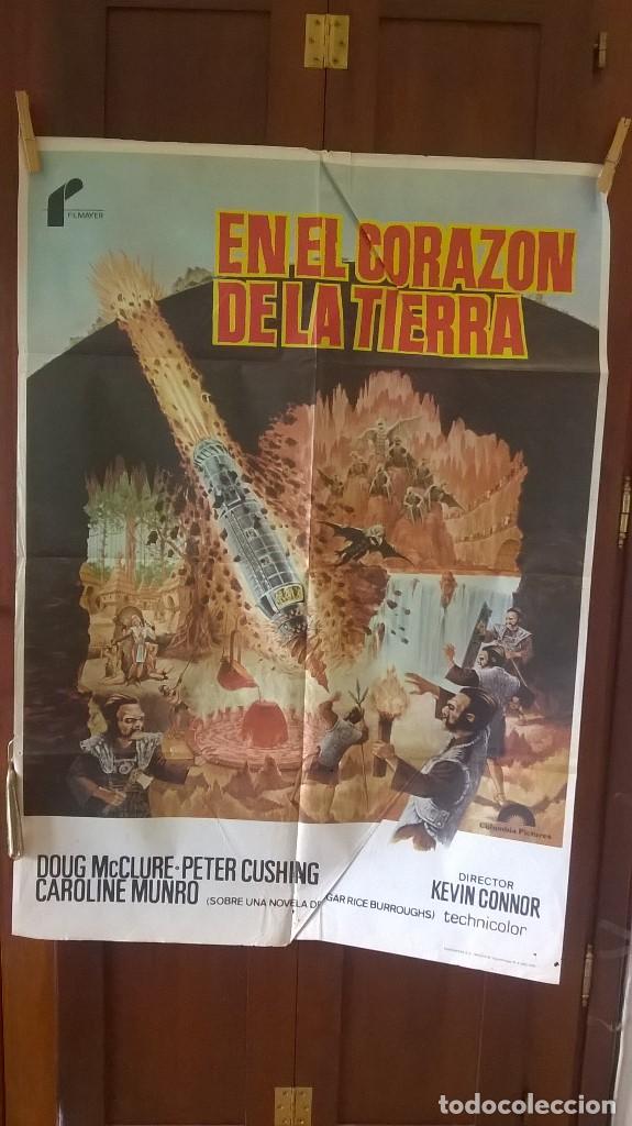 Cine: poster en el corazon de la tierra - Foto 1