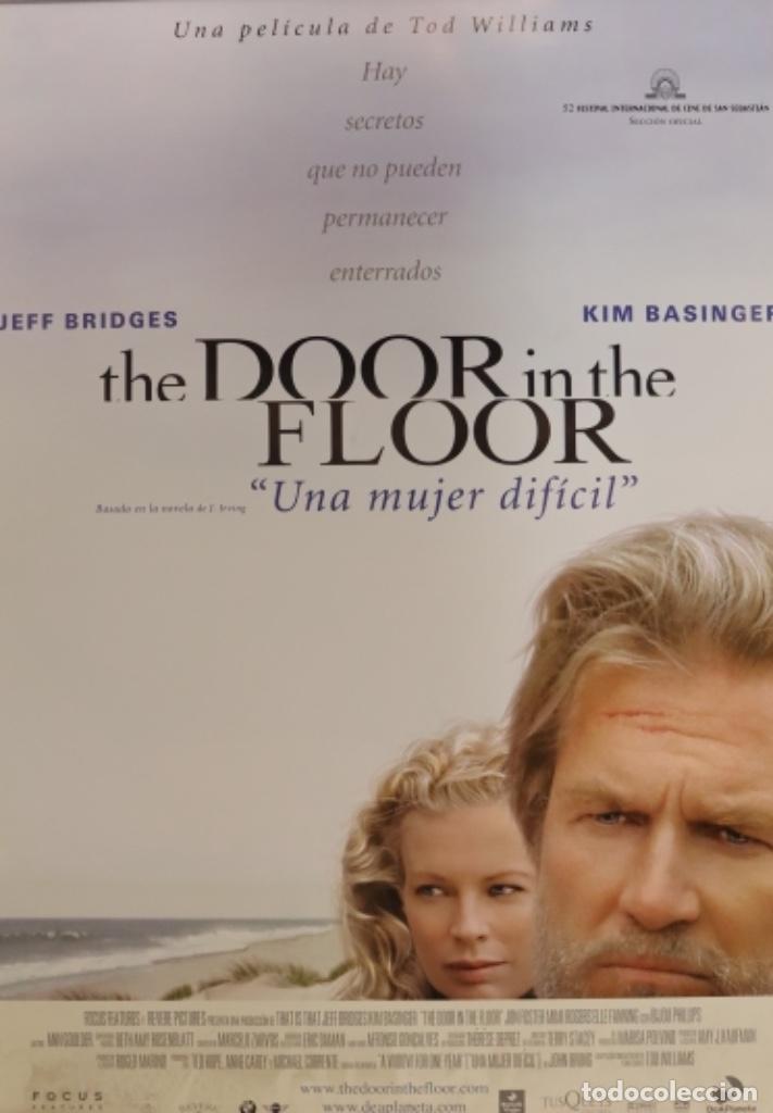 Cine: P&oacute;ster The door in the floor
