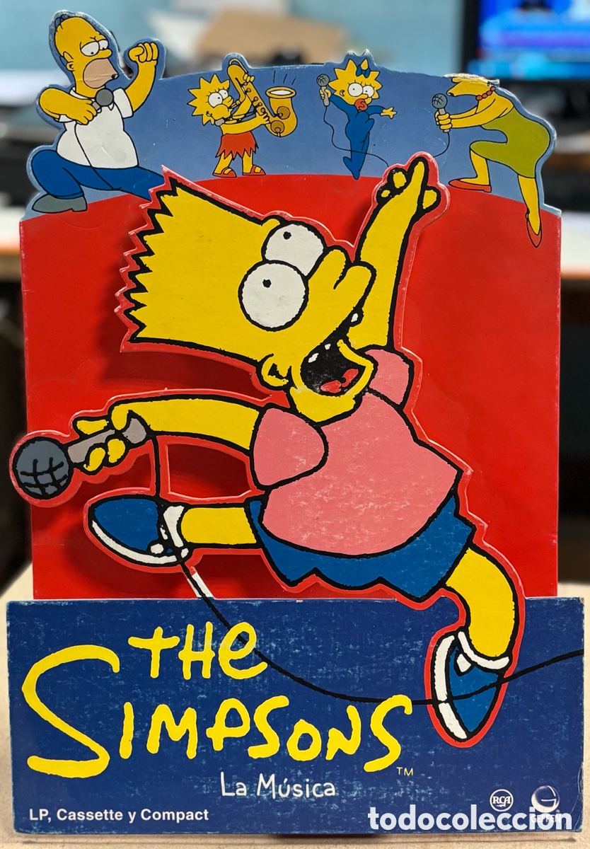Cine: THE SIMPSONS &ldquo;LA M&Uacute;SICA&rdquo;. (RCA 1990). CARTEL EXPOSITOR PUBLICITARIO TROQUELADO CART&Oacute;N. CON RELIEVE