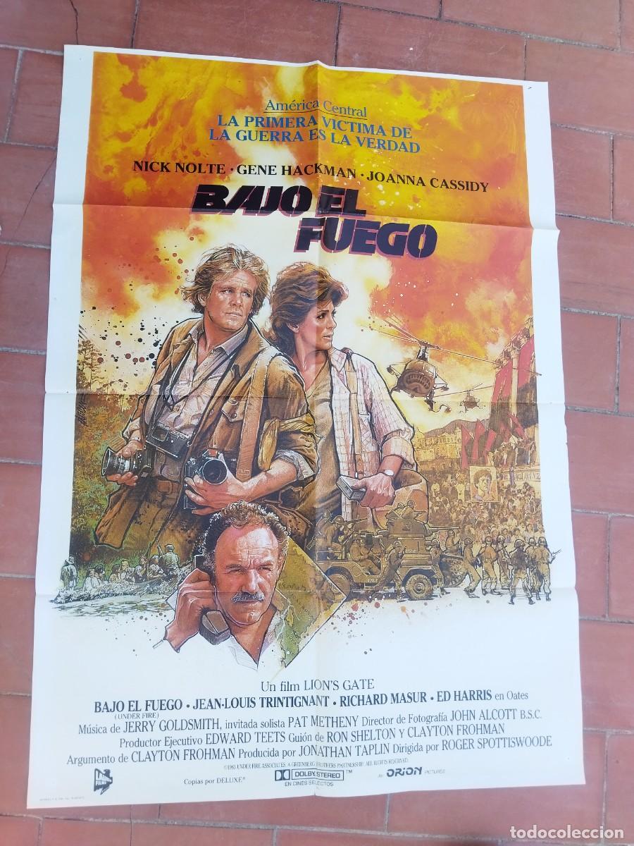 Cine: cartel de cine 70x 100 aprox movie poster BAJO EL FUEGO nick nolte gene hackman roger spottiswoode