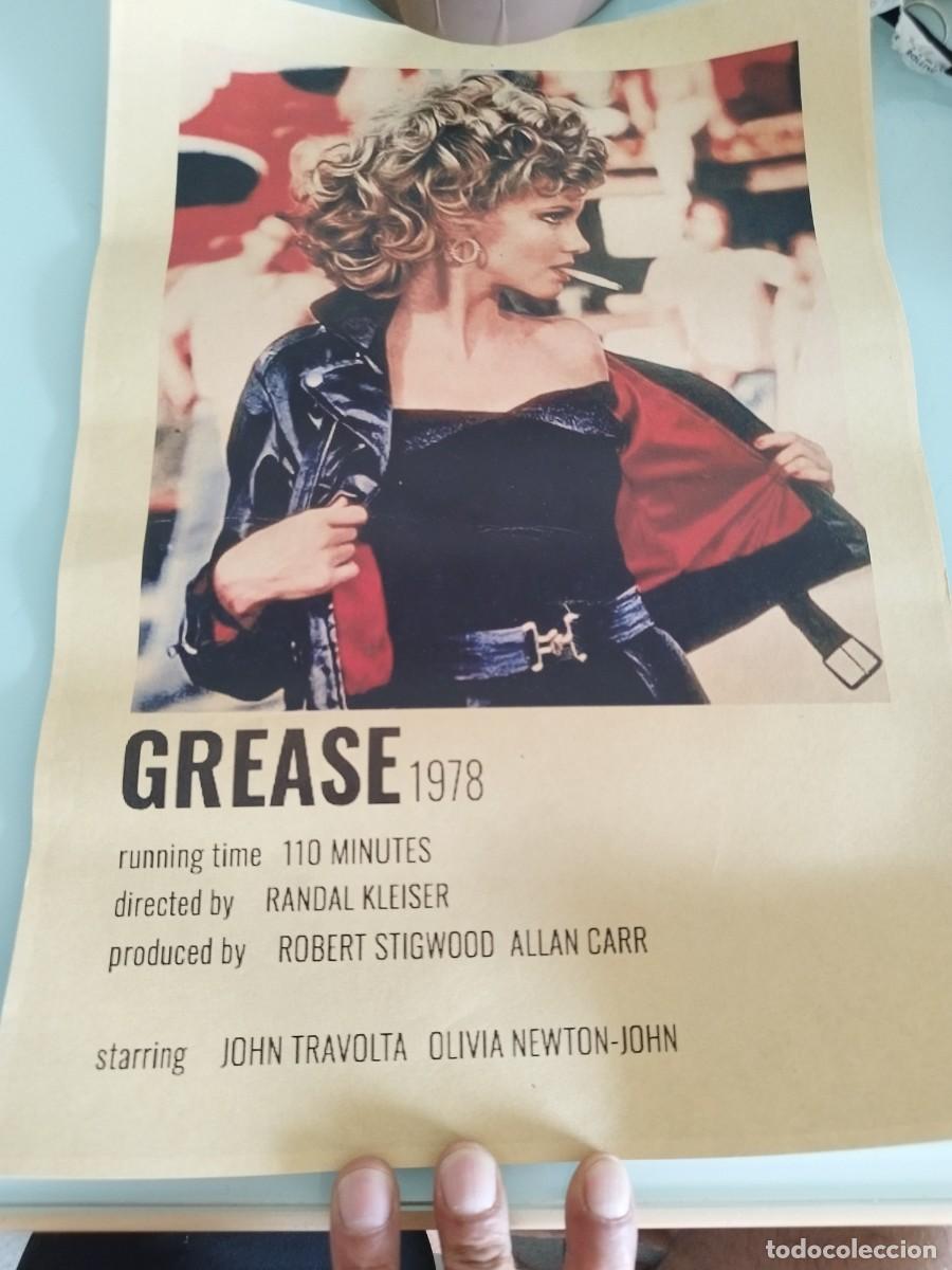 Cine: Poster,cartel de la pel&iacute;cula Grease. Olivia Newton-John con su ic&oacute;nica chaqueta de cuero negro.