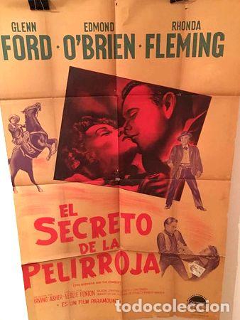 Kino: afiche de cine el secreto de la pelirroja deteriorado