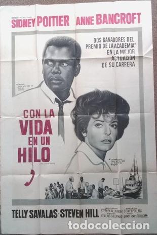 Kino: antiguo afiche de pelicula con la vida en un hilo 706