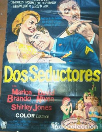 Kino: antiguo afiche de peliculados seductorescon pequeno detall