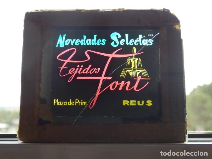 Cine: Diapositiva cristal publicidad Cine Novedades selectas tejidos Font reus a&ntilde;os 50 o 60