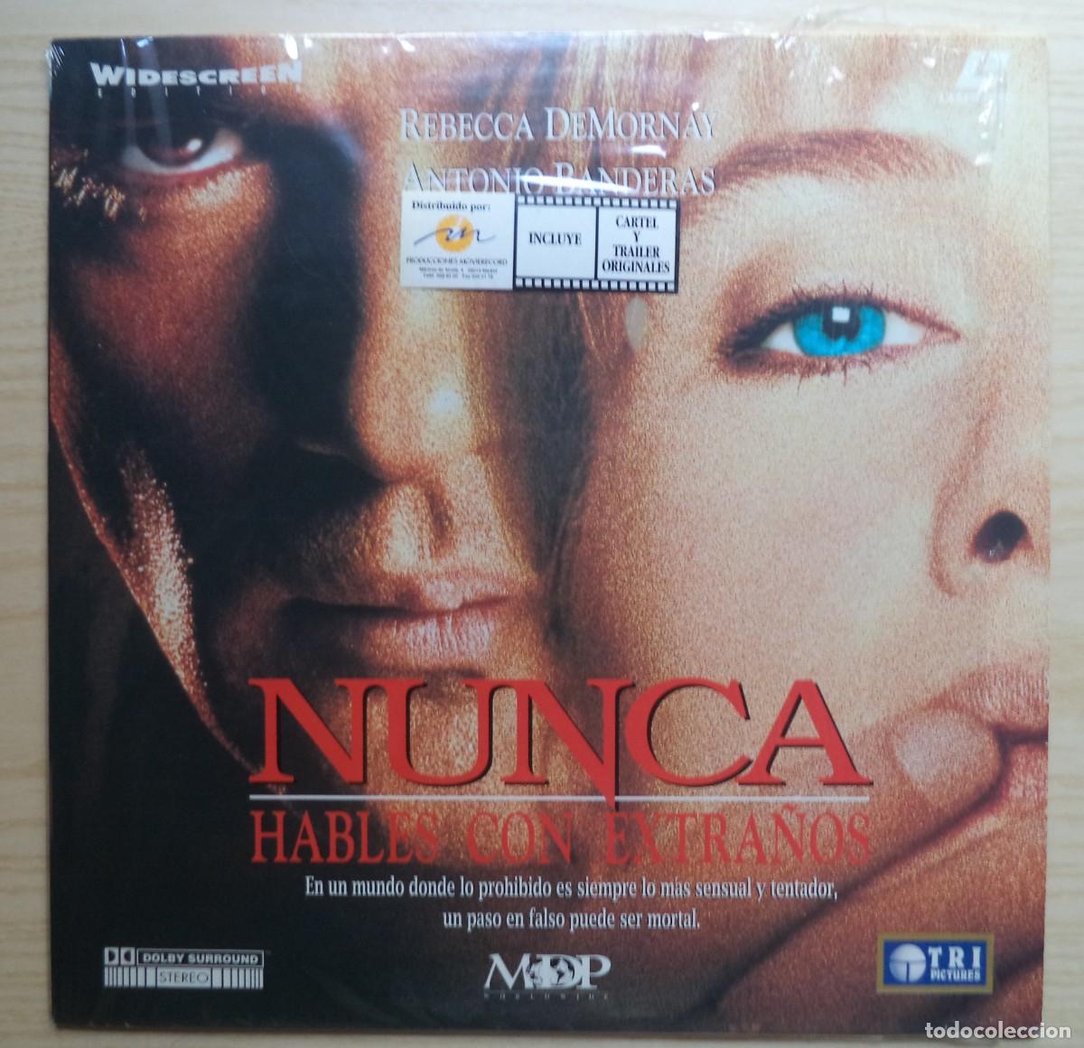 Cine: PELICULA LASER DISC: NUNCA HABLES CON EXTRA&Ntilde;OS - Foto 1