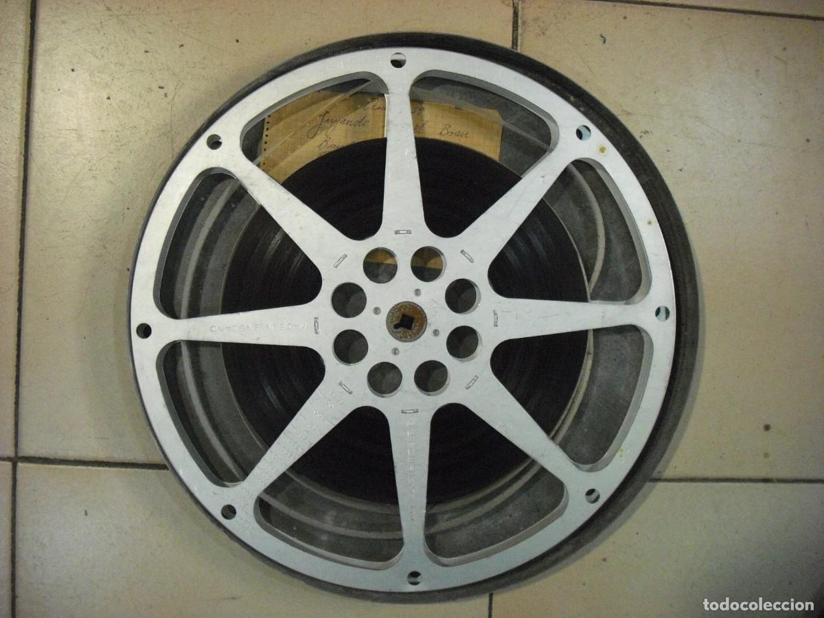 Cine: ANTIGUA BOBINA CON CINTA Y CAJA METALICA 35 CM DE DIAMETRO.1959 VER DESCRIPCION.