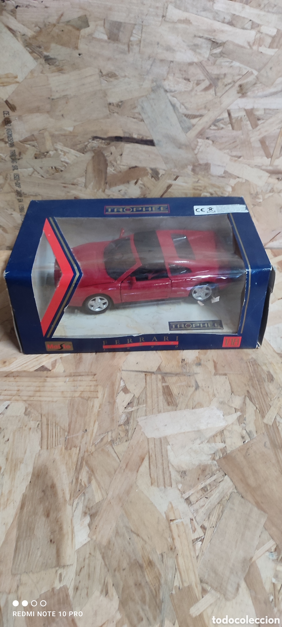 Coches a escala: Maisto. Ferrari 348 TS de 1990 Trophee en su blister. Escala 1:18