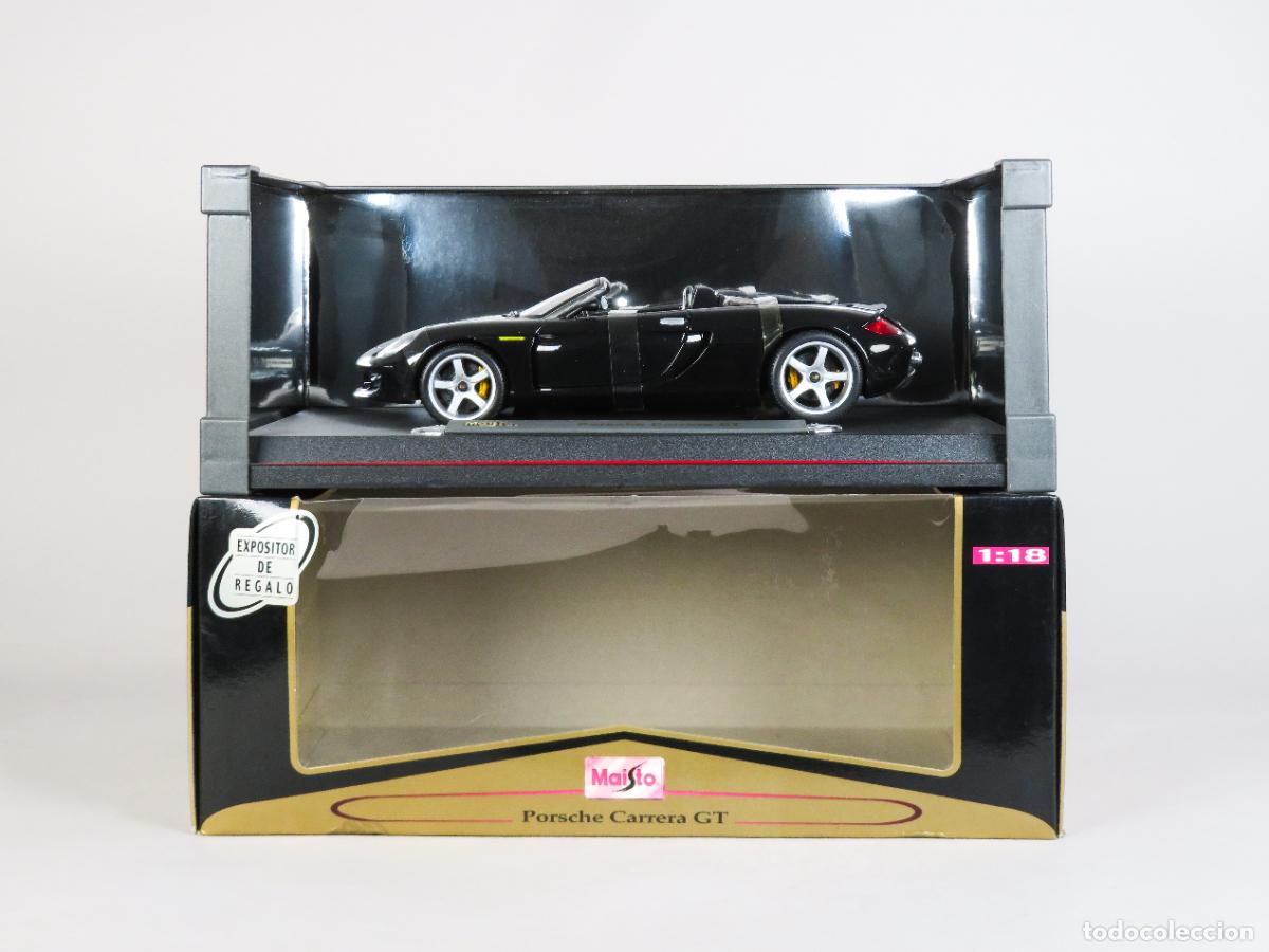Coches a escala: Porsche Carrera GT Maisto color negro 1/18 nuevo con caja
