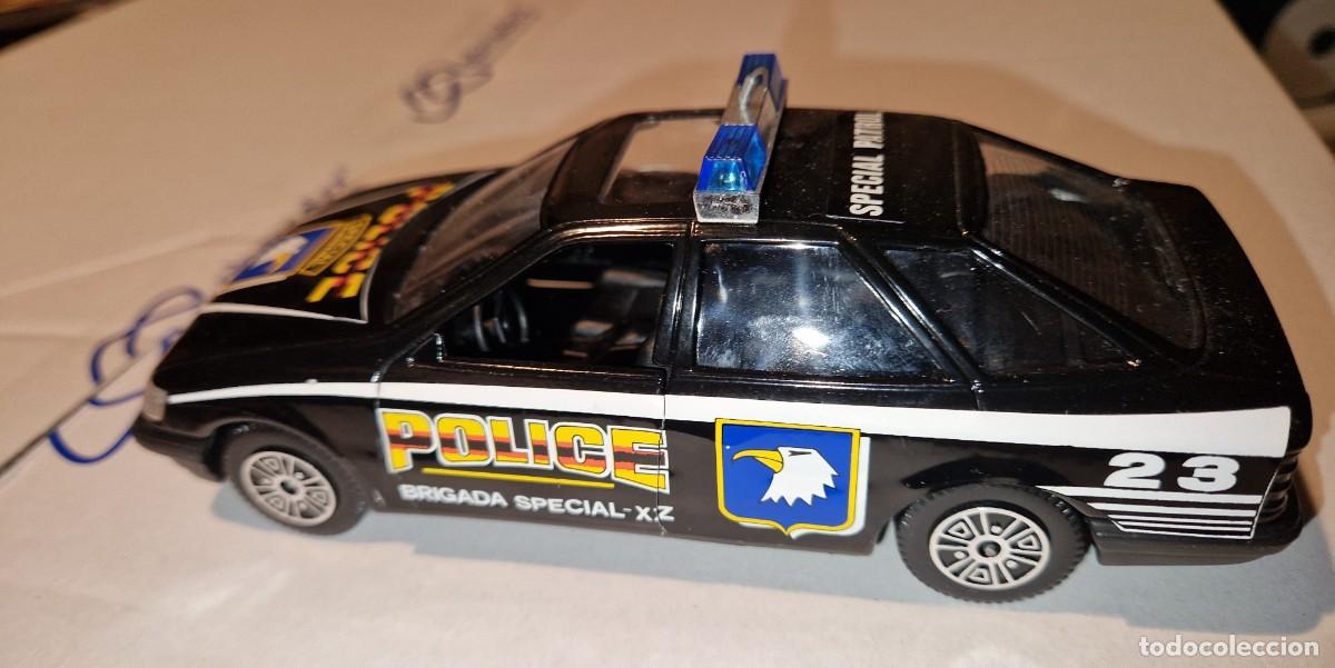 Coches a escala: FORD SCORPIO POLICIA DE GUILOY ESCALA 1/24