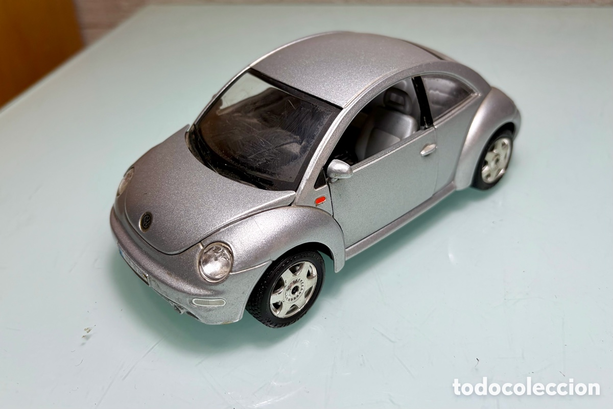 Coches a escala: Coche Volkswagen New Beetle 1998 de Burago