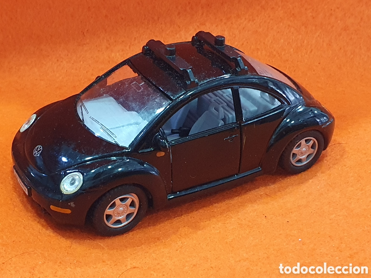 Coches a escala: Volkswagen New Beetle. 1:32. Kinsmart. (L129)
